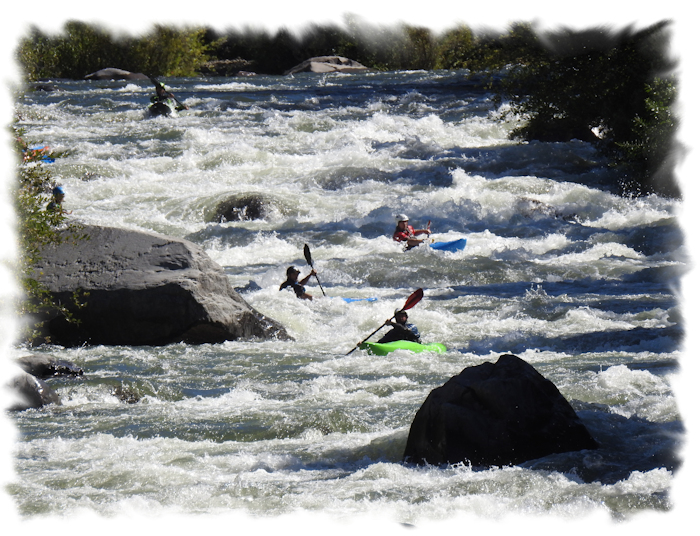 Kayakers on the Pit River rapids