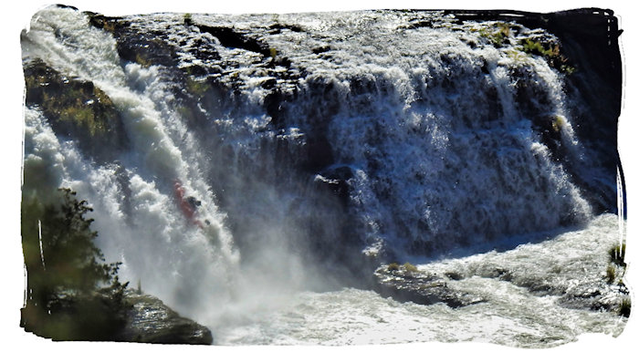 Kayaker runs center chute